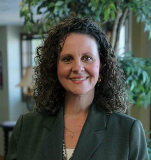 Maria Lohmeyer poses for professional headshot 